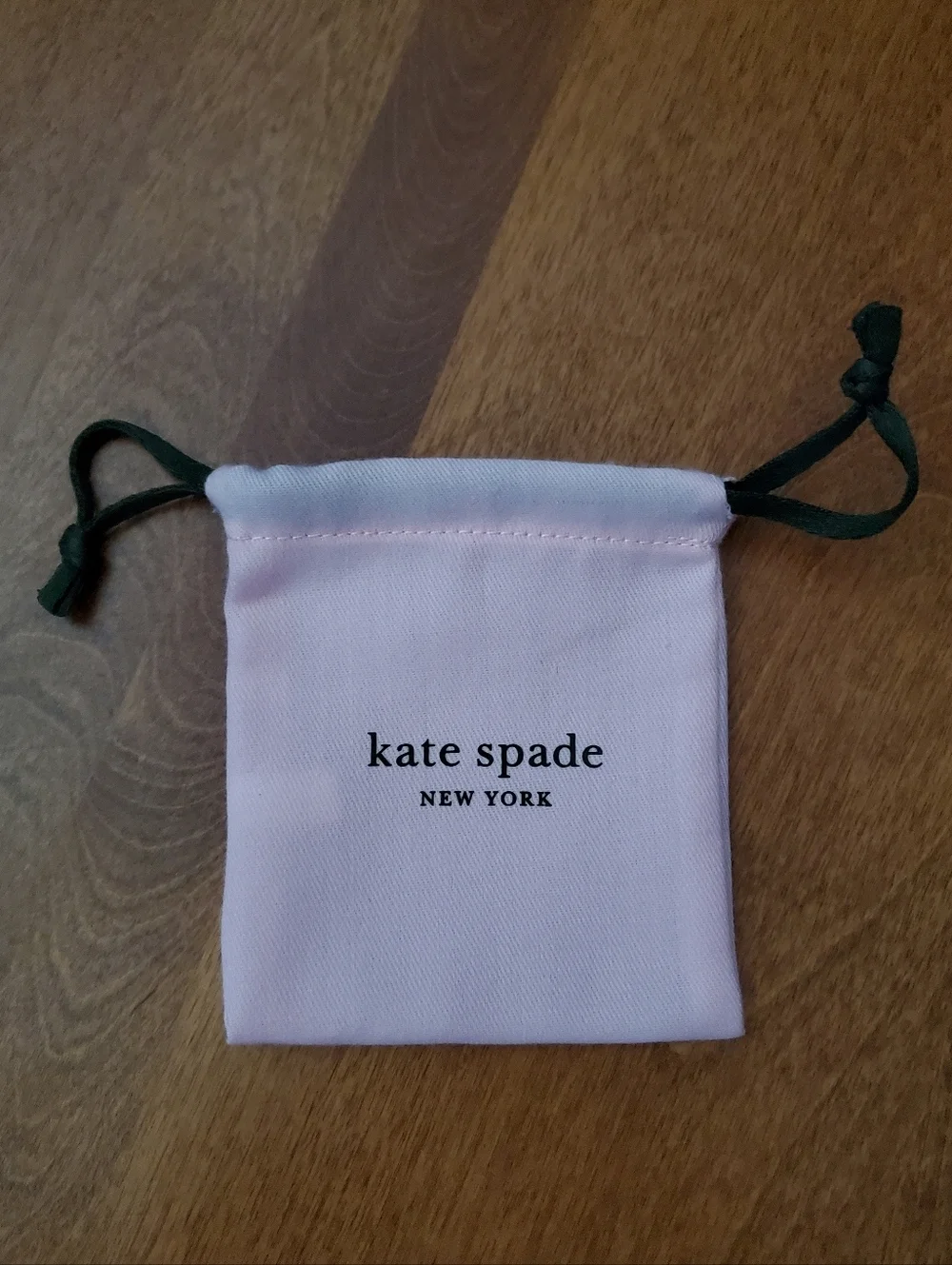 kate spade Pink Drawstring Jewelry Pouch with Green Cords
